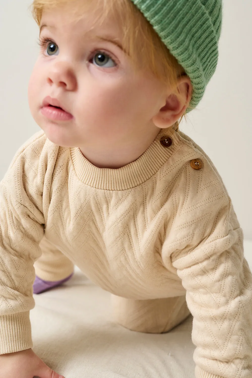Quilted zigzag baby sweatshirt